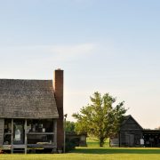 Farmhouse with a blue sky backdrop